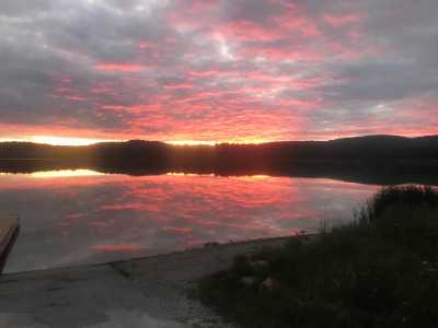 Reflective sunrise on Shelburne Pond